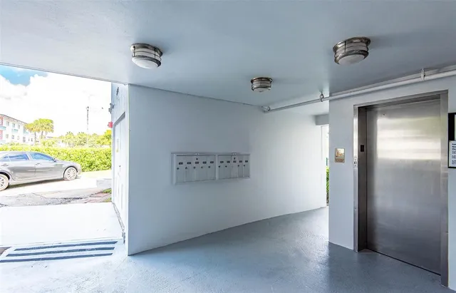 a view of hallway with a large window