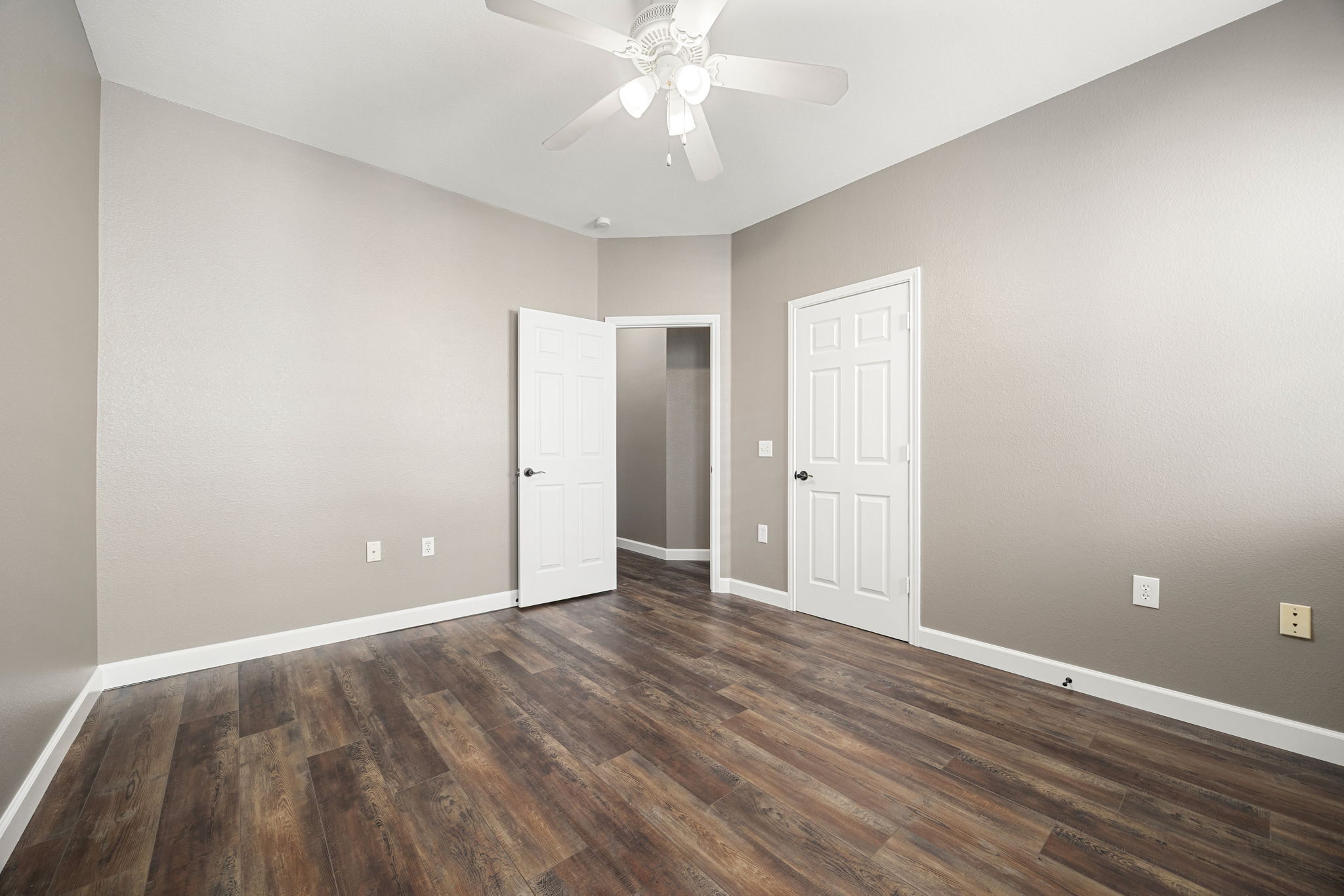 4805 Louis Avenue Austin, TX 78721 - Photo 13 of 23 a view of an empty room with wooden floor