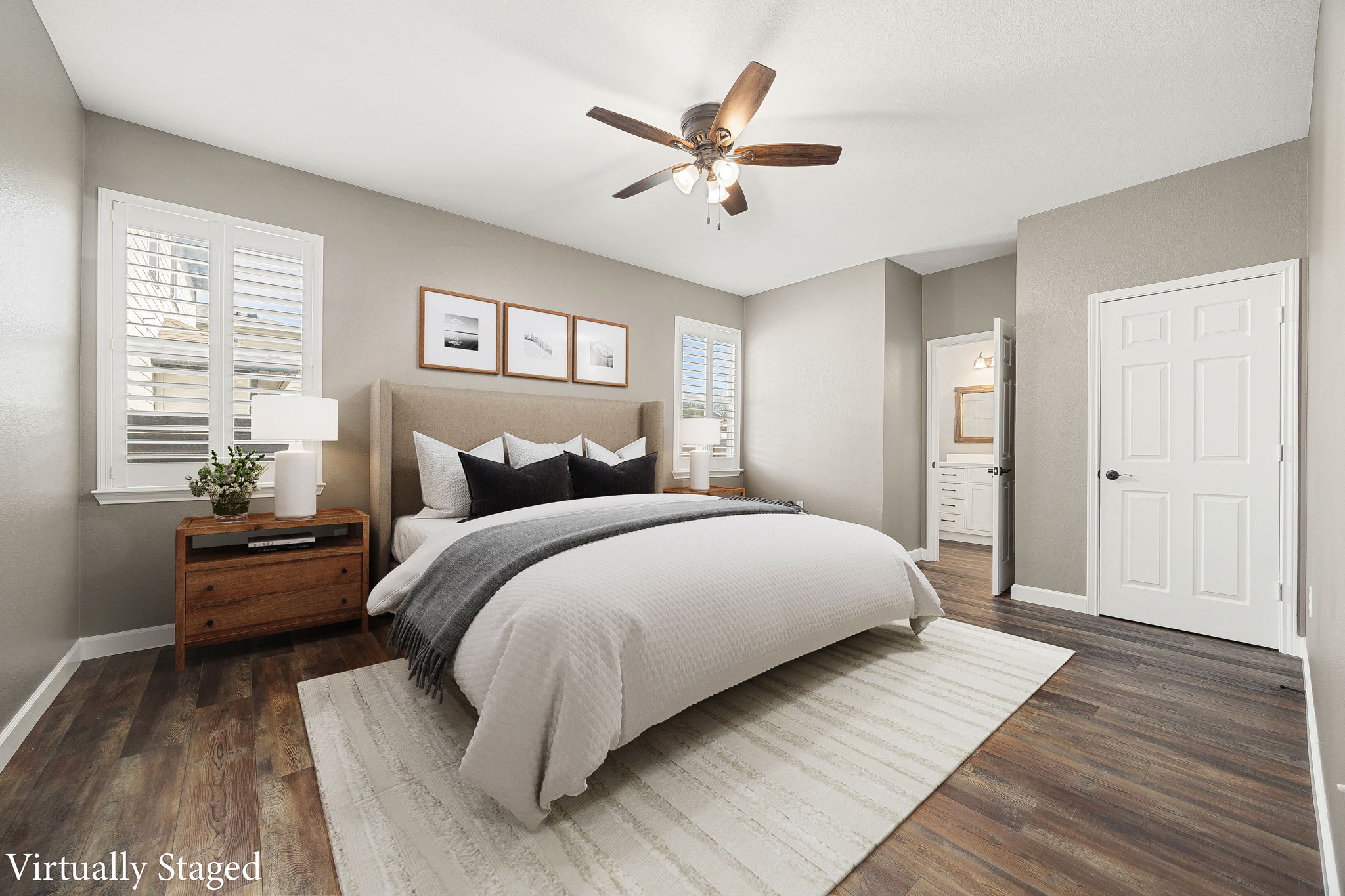 4805 Louis Avenue Austin, TX 78721 - Photo 7 of 23 a bedroom with a large bed and a ceiling fan