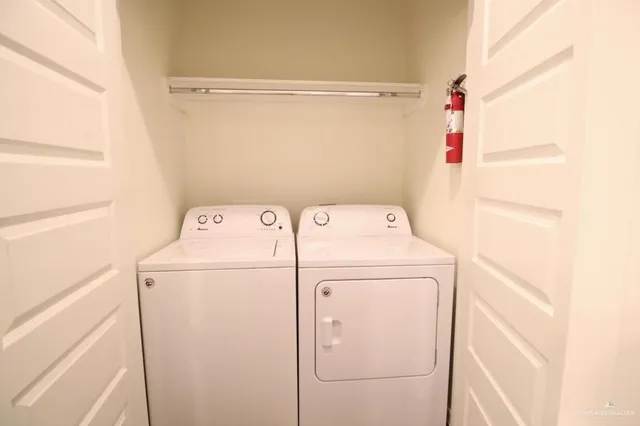 a bathroom with a granite countertop sink toilet and bathtub