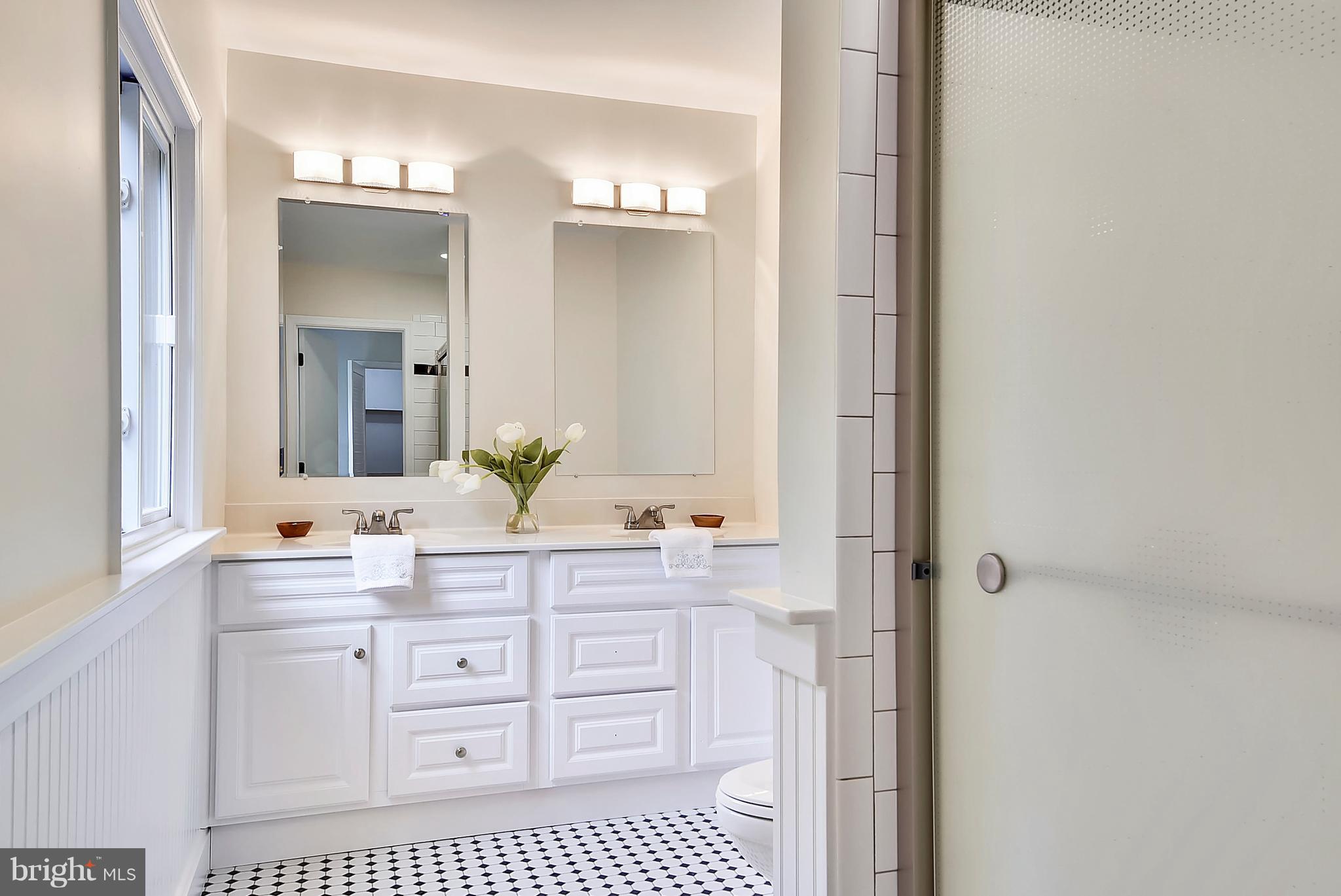 1625 Sparks Road Sparks, MD 21152 - Photo 22 of 30 a bathroom with a sink a vanity and a mirror