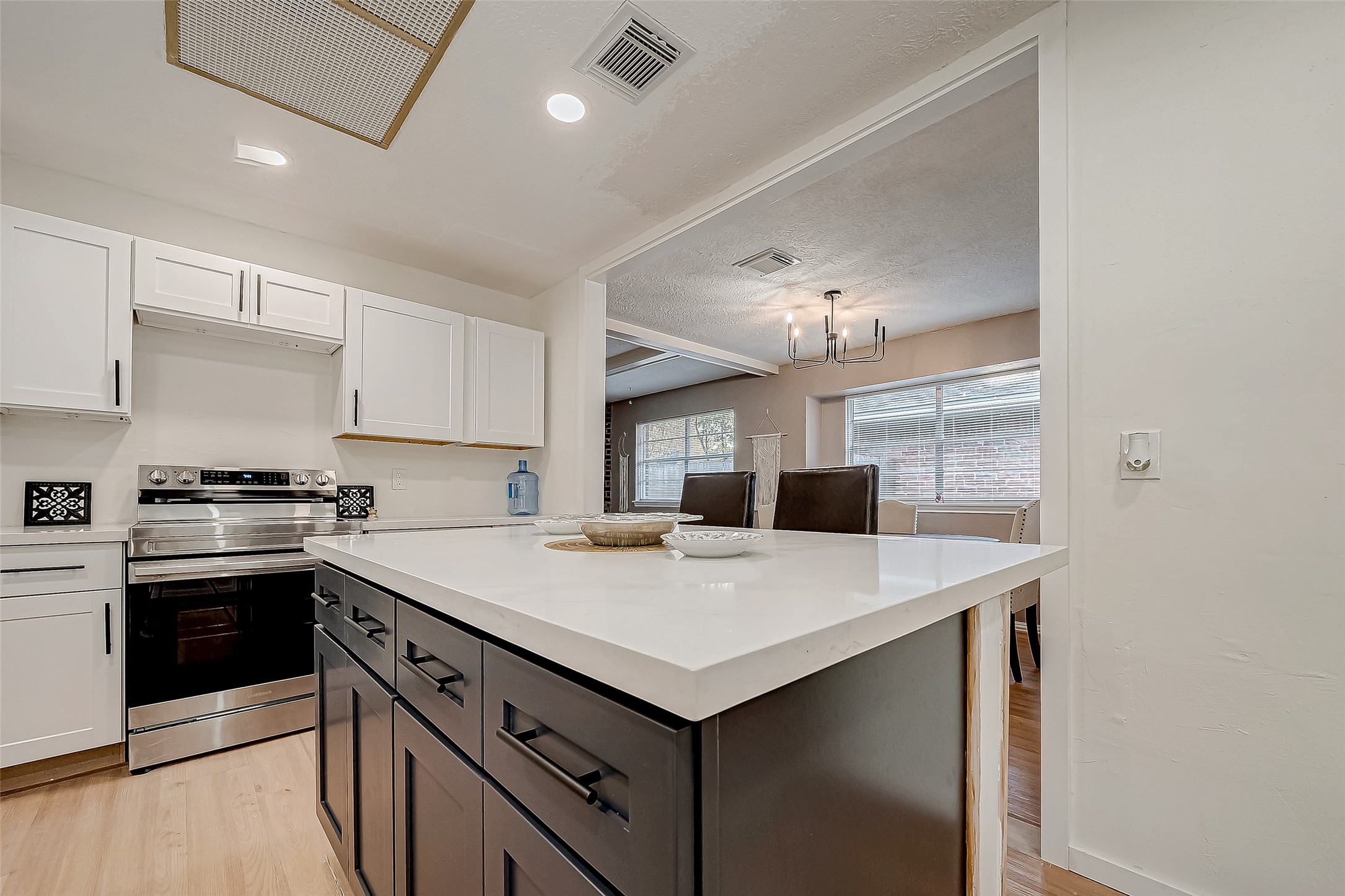 4731 Casemont Drive Spring, TX 77388 - Photo 11 of 50 a kitchen with a stove a sink and a refrigerator