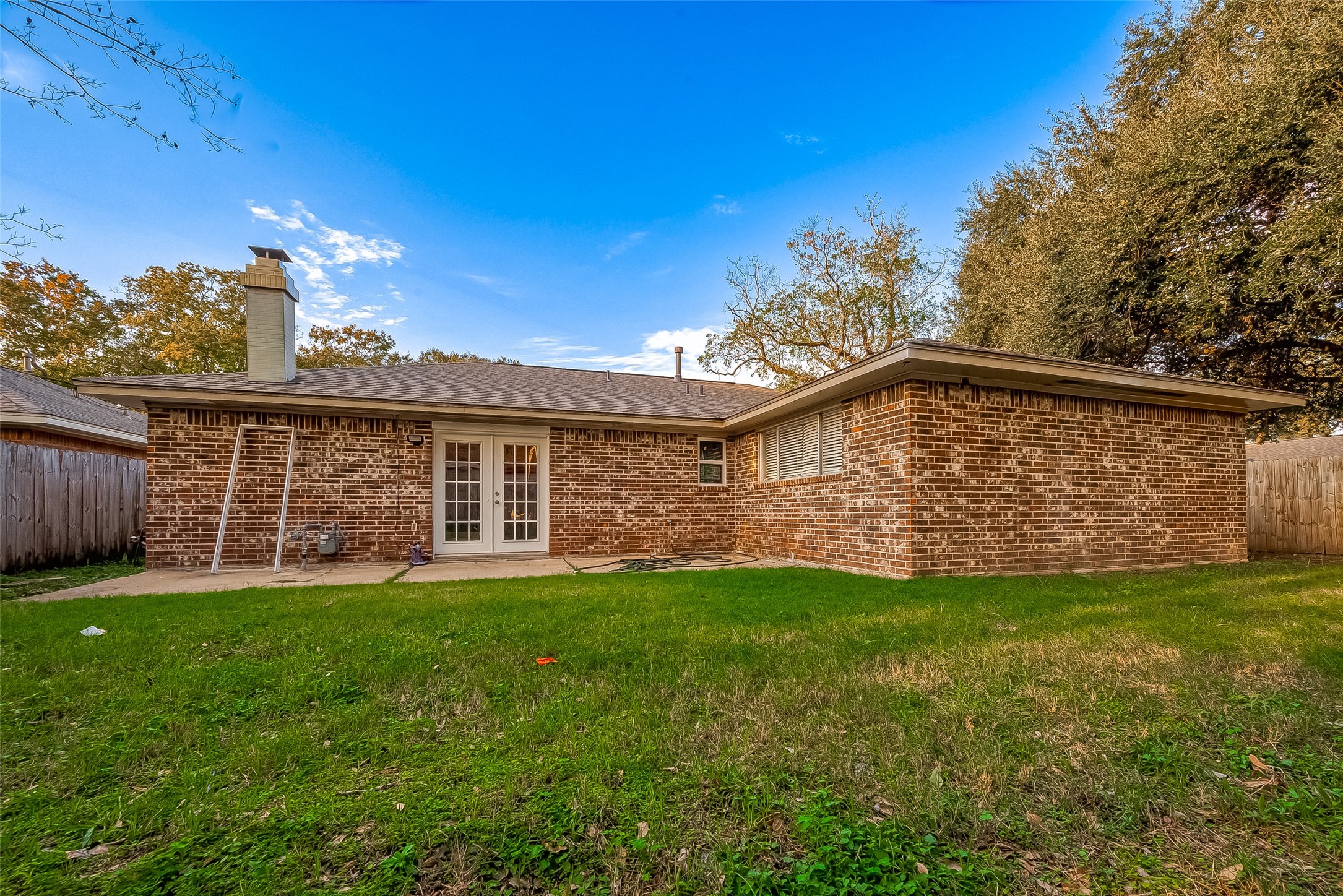 4731 Casemont Drive Spring, TX 77388 - Photo 48 of 50 a view of a house with a yard and deck
