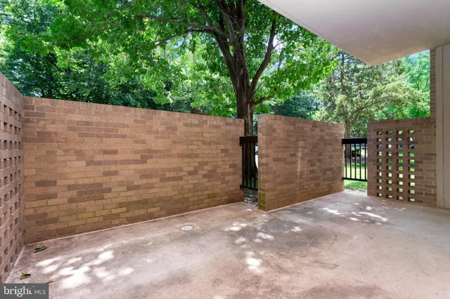 a bathroom with a bathtub shower sink vanity and toilet