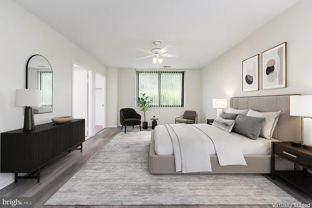 a bedroom with bed and a couch