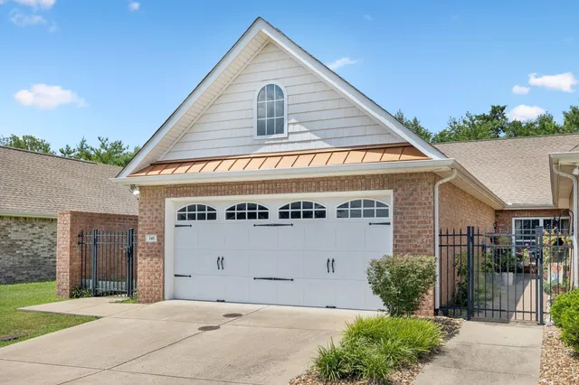 a view of a house with a garage