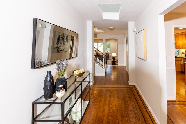 3523 Oak Drive Menlo Park, CA 94025 - Photo 12 of 20 a view of a hallway with wooden floor and furniture