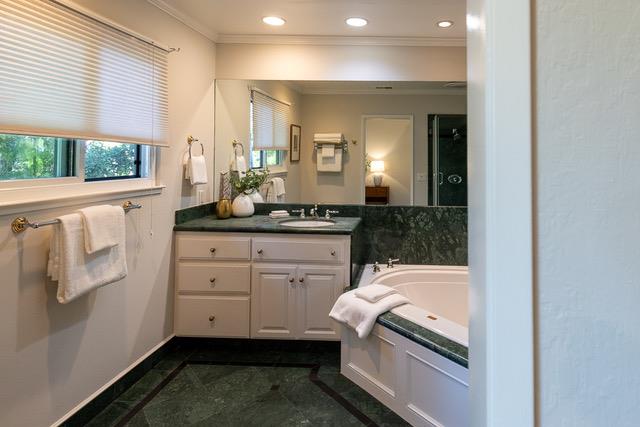 3523 Oak Drive Menlo Park, CA 94025 - Photo 15 of 20 a bathroom with a sink and a mirror
