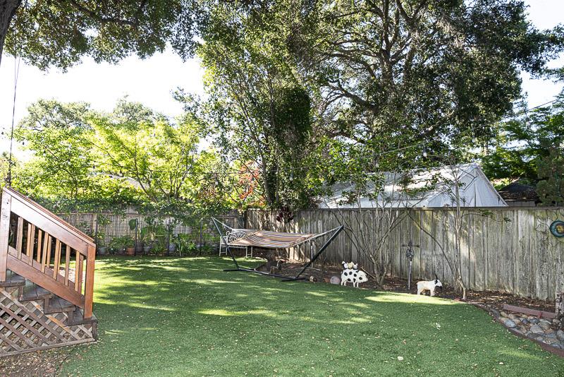3523 Oak Drive Menlo Park, CA 94025 - Photo 20 of 20 a backyard of a house with lots of plants and lake view