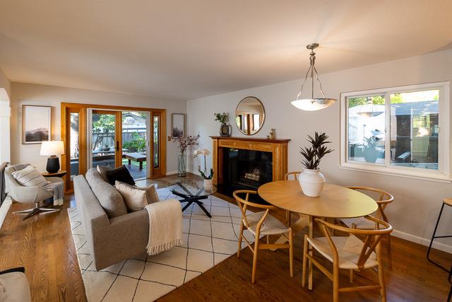 3523 Oak Drive Menlo Park, CA 94025 - Photo 3 of 20 a living room with furniture a window and a fireplace