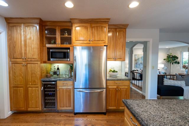 3523 Oak Drive Menlo Park, CA 94025 - Photo 6 of 20 a kitchen with stainless steel appliances granite countertop a refrigerator and a stove top oven