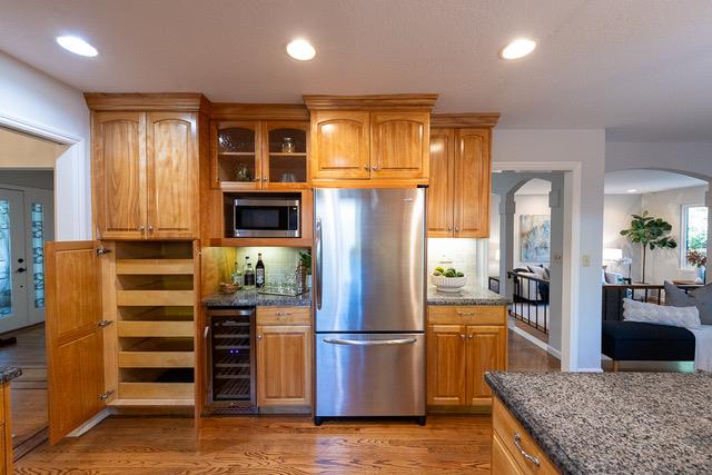 3523 Oak Drive Menlo Park, CA 94025 - Photo 7 of 20 a kitchen with stainless steel appliances granite countertop a refrigerator and a stove