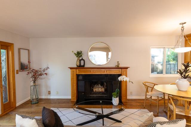 3523 Oak Drive Menlo Park, CA 94025 - Photo 8 of 20 a living room with furniture a window and a fireplace