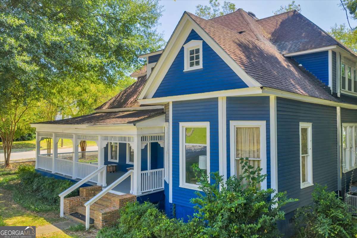 212 East Union Street Vienna, GA 31092 - Photo 50 of 62 front view of house with a yard