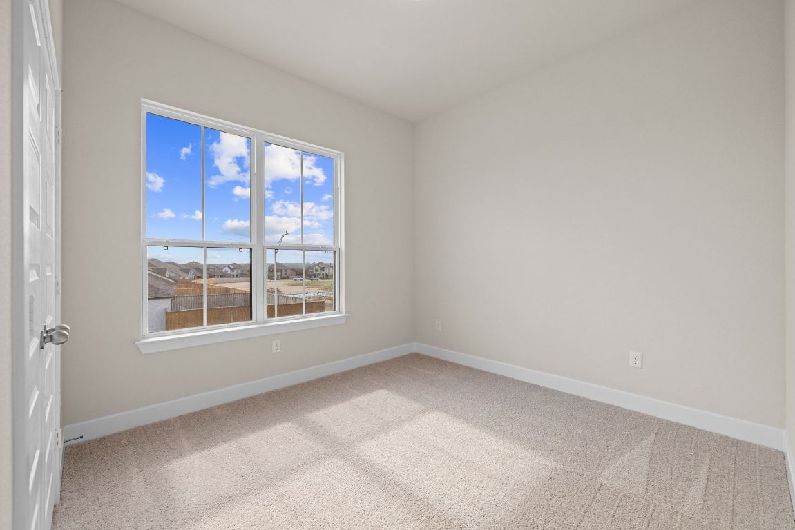621 Buckaroo Drive Georgetown, TX 78633 - Photo 20 of 30 a view of an empty room with a window