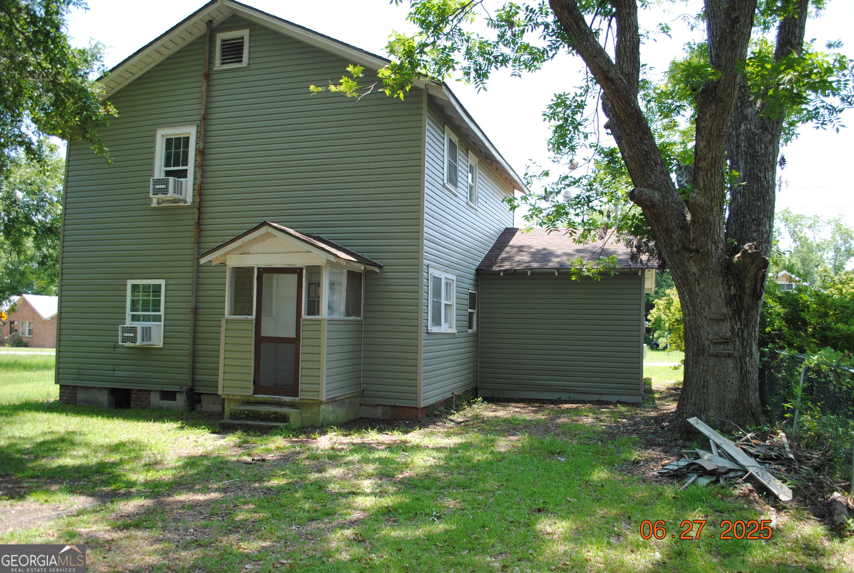 532 Calhoun Street Swainsboro, GA 30401 - Photo 3 of 10 front view of a house with a yard