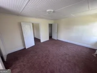 an empty room with a natural light