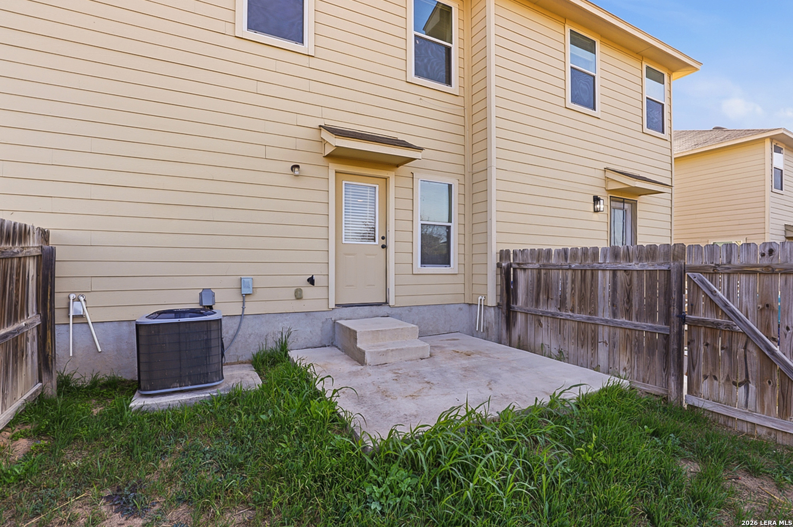 16821 Showdown Path, Unit 3 Schertz, TX 78154 - Photo 25 of 25 a view of backyard with barbeque grill and wooden fence