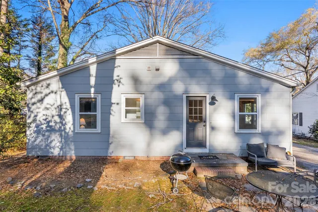 a front view of a house with yard