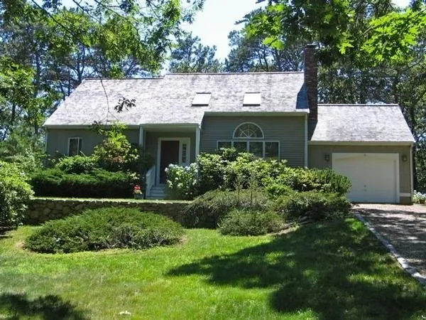 a view of a house with a garden