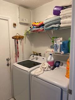 10251 Breezeway Place Boca Raton, FL 33428 - Photo 20 of 20 a utility room with dryer and washer