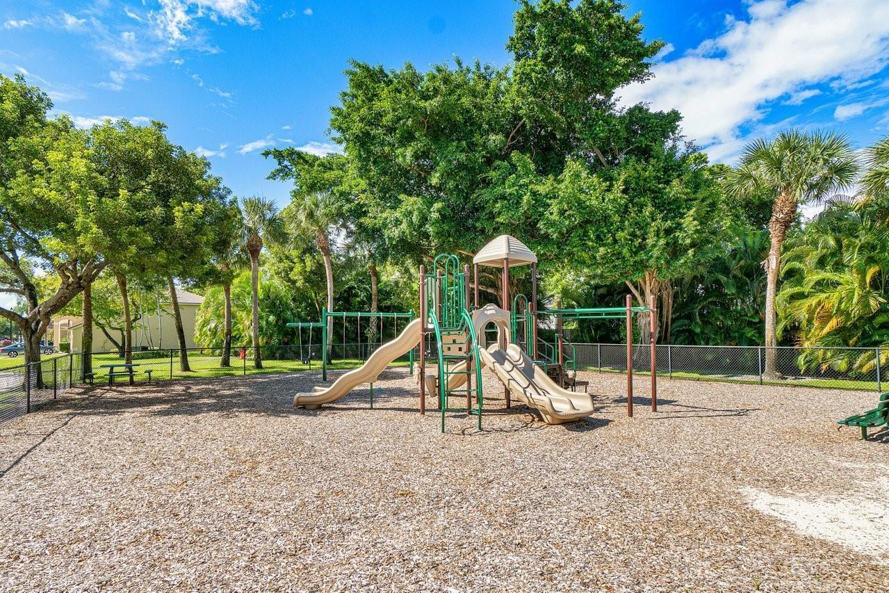 10251 Breezeway Place Boca Raton, FL 33428 - Photo 8 of 20 a view of a park with a slide