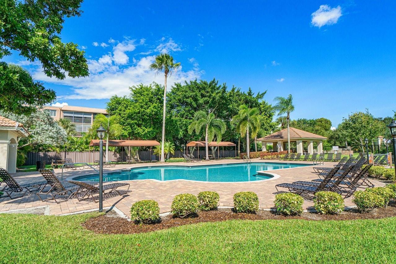 10251 Breezeway Place Boca Raton, FL 33428 - Photo 9 of 20 a view of a house with a yard