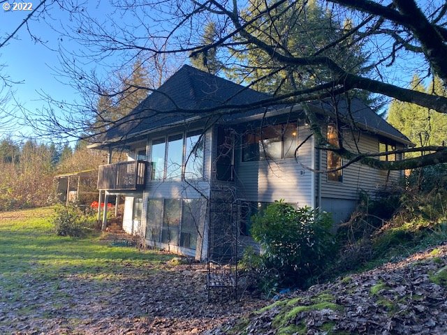7705 Northeast Quarry Road La Center, WA 98629 - Photo 1 of 27 a view of a house with a yard