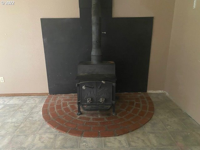 7705 Northeast Quarry Road La Center, WA 98629 - Photo 21 of 27 a water heater sitting in a bathroom