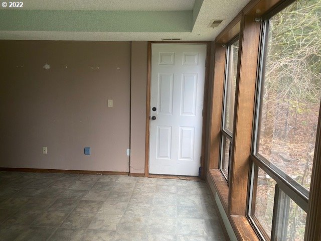 7705 Northeast Quarry Road La Center, WA 98629 - Photo 22 of 27 a view of an empty room with a window