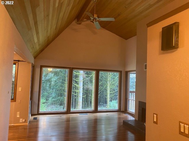 7705 Northeast Quarry Road La Center, WA 98629 - Photo 3 of 27 a view of room with window and wooden floor