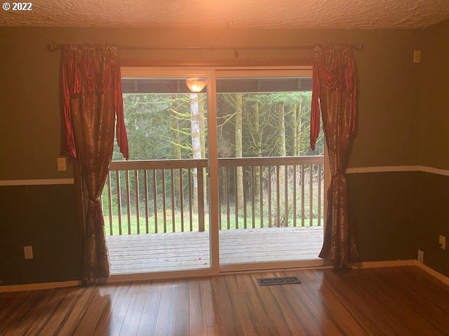 7705 Northeast Quarry Road La Center, WA 98629 - Photo 10 of 27 a view of wooden floor and a window