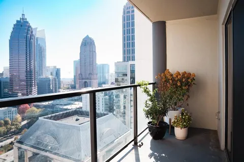 a view of balcony and dining room