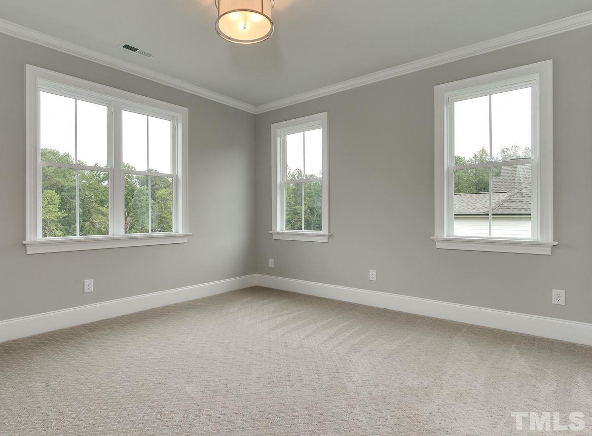 8809 Breeland Way Raleigh, NC 27613 - Photo 22 of 25 a view of room with window