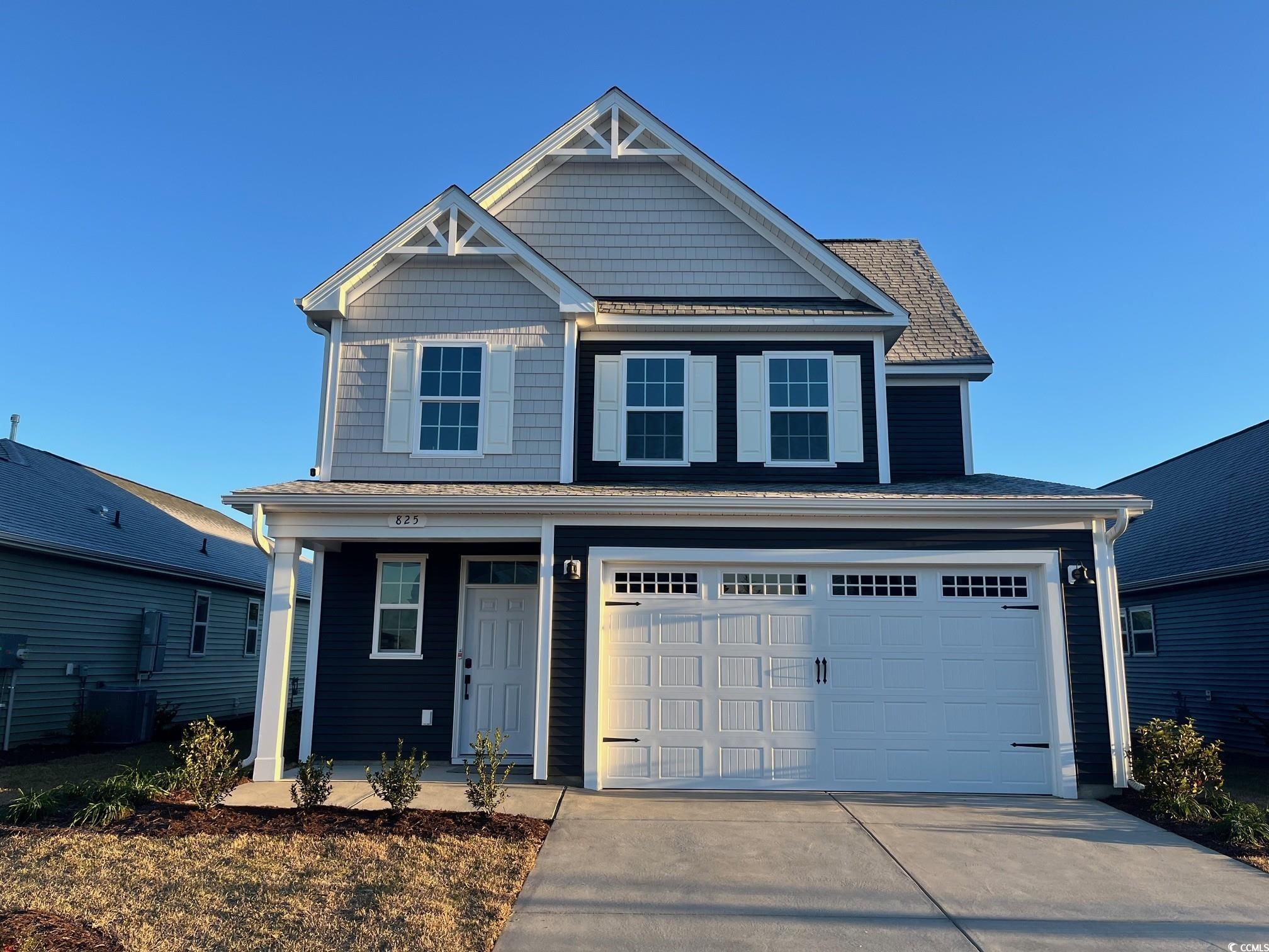 825 Cascade Loop Little River, SC 29566 - Photo 1 of 9 View of front of house with central AC unit and a