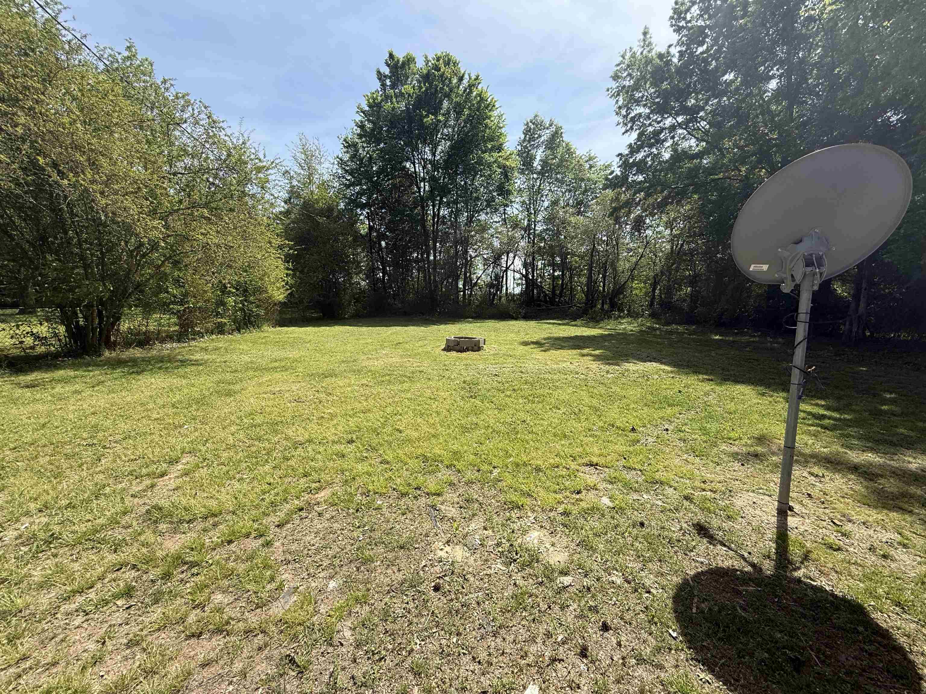 112 Tapp Drive Somerville, TN 38068 - Photo 14 of 16 a view of a swimming pool with a yard