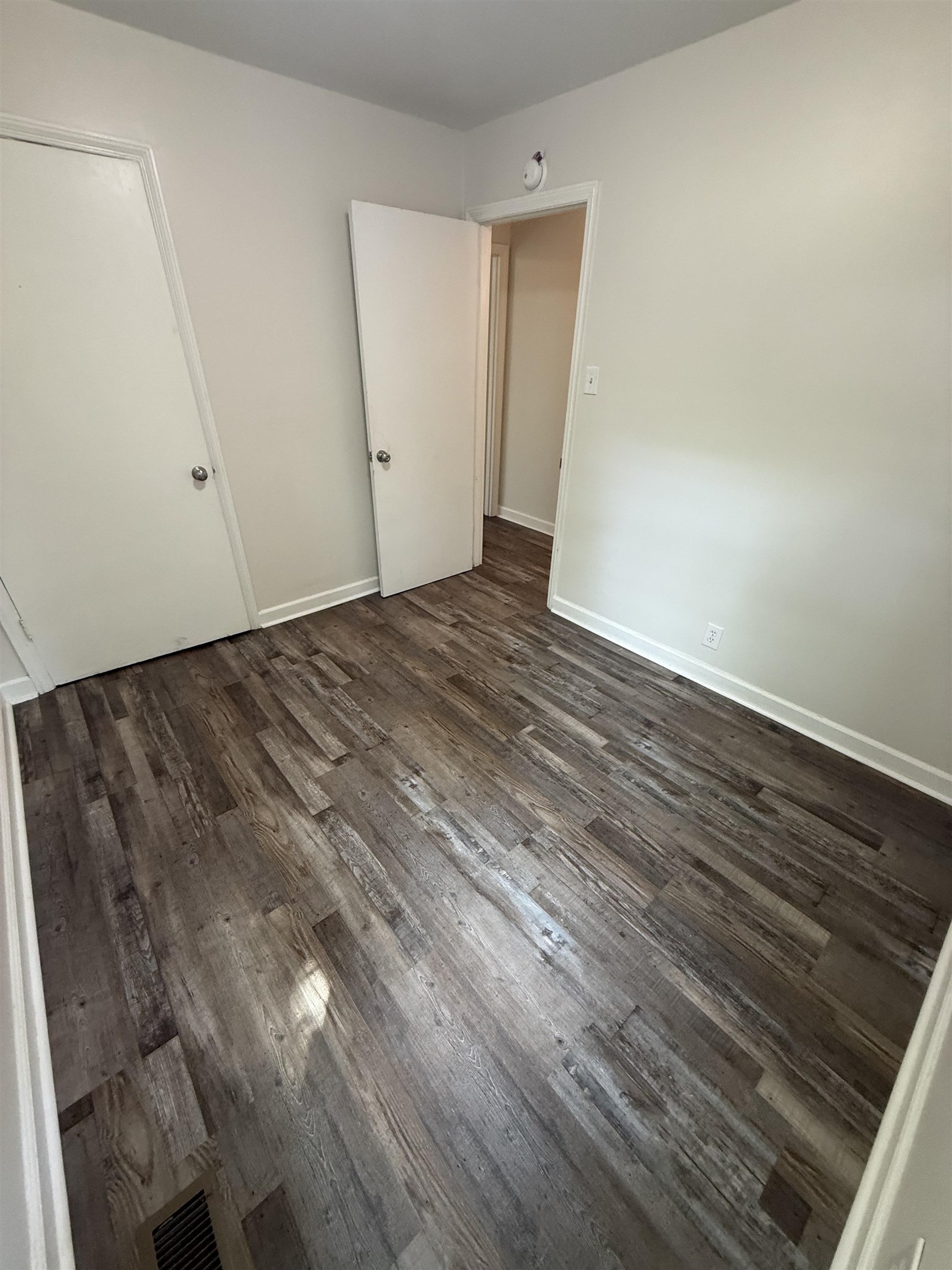 112 Tapp Drive Somerville, TN 38068 - Photo 10 of 16 a view of empty room with wooden floor