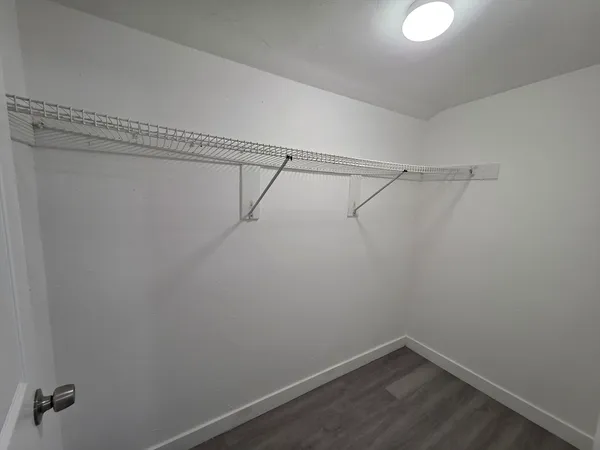 a view of a room with racks on the wall