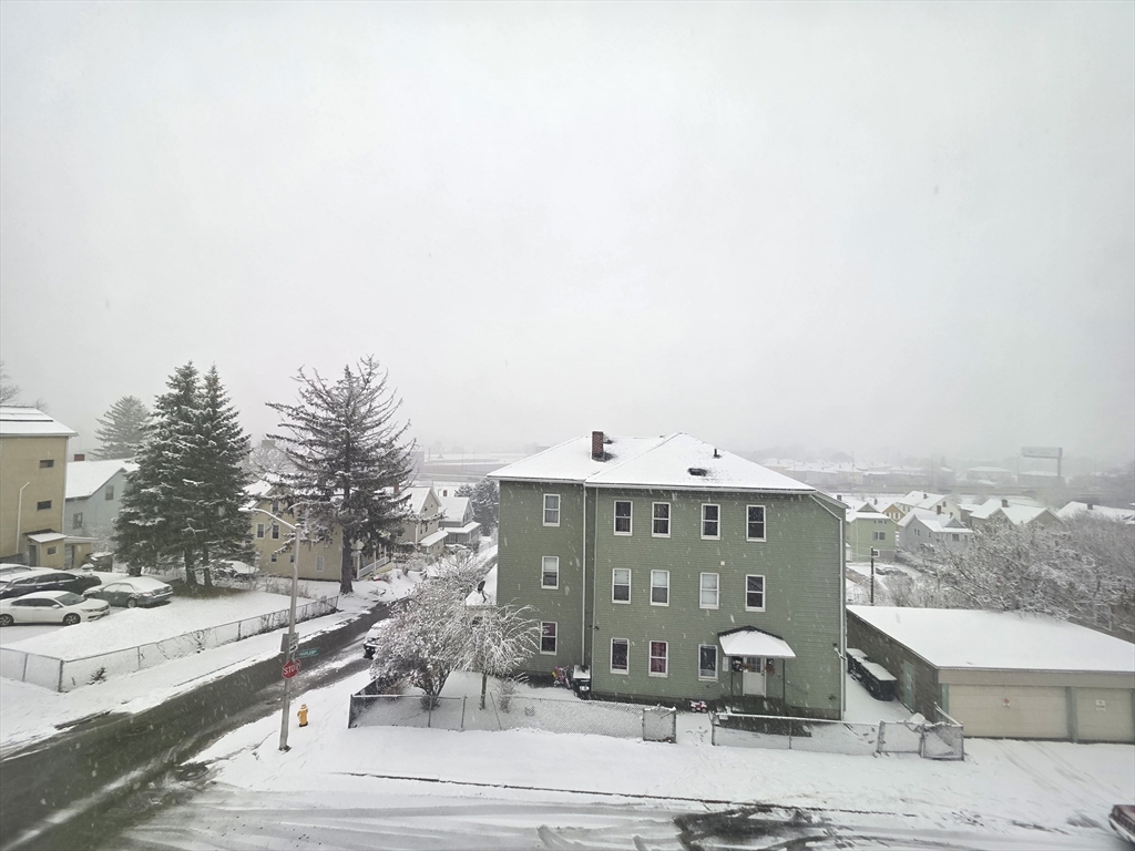 39 Harlem Street, Unit 3 Worcester, MA 01610 - Photo 18 of 18 a view of a city street from a terrace