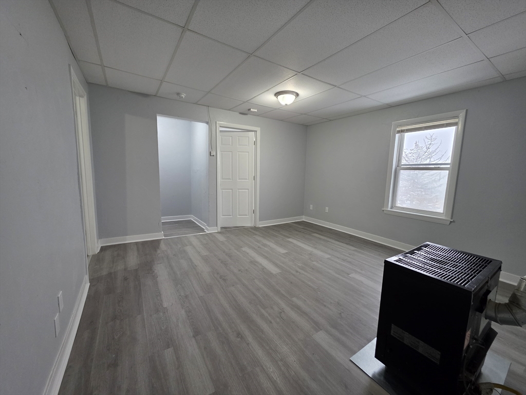 39 Harlem Street, Unit 3 Worcester, MA 01610 - Photo 5 of 18 a view of workspace with wooden floor