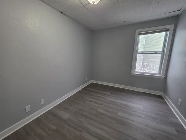 an empty room with a window