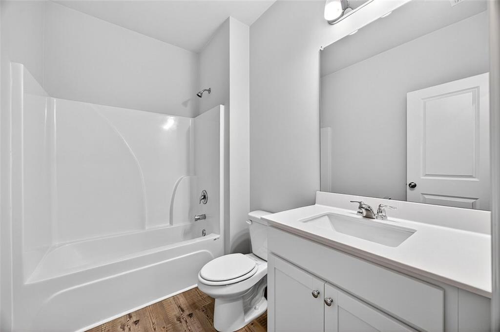 3455 Jasmine Way Atlanta, GA 30331 - Photo 29 of 46 a bathroom with a sink a toilet and a bathtub