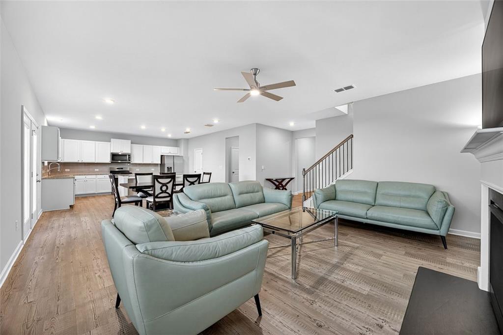 3455 Jasmine Way Atlanta, GA 30331 - Photo 10 of 46 a living room with furniture and kitchen view