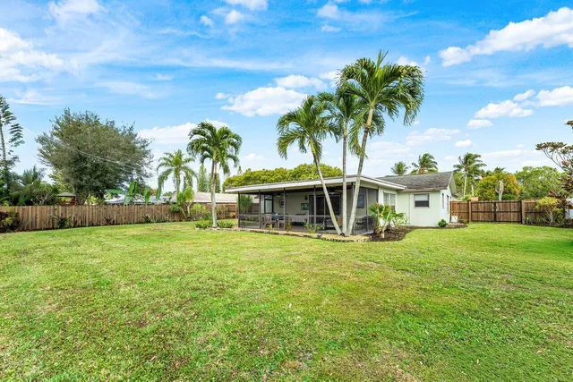 a view of a house with a big yard