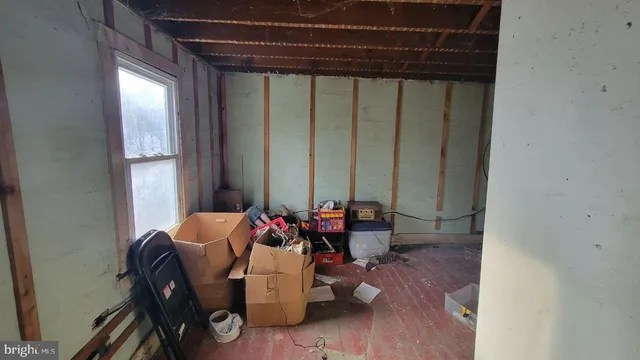 a room with lots of appliances and furniture