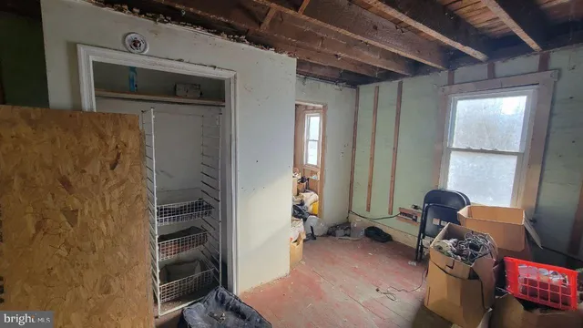 a view of a closet with storage