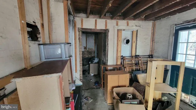 a view of storage and utility room