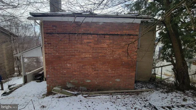 a brick house with a door and a door