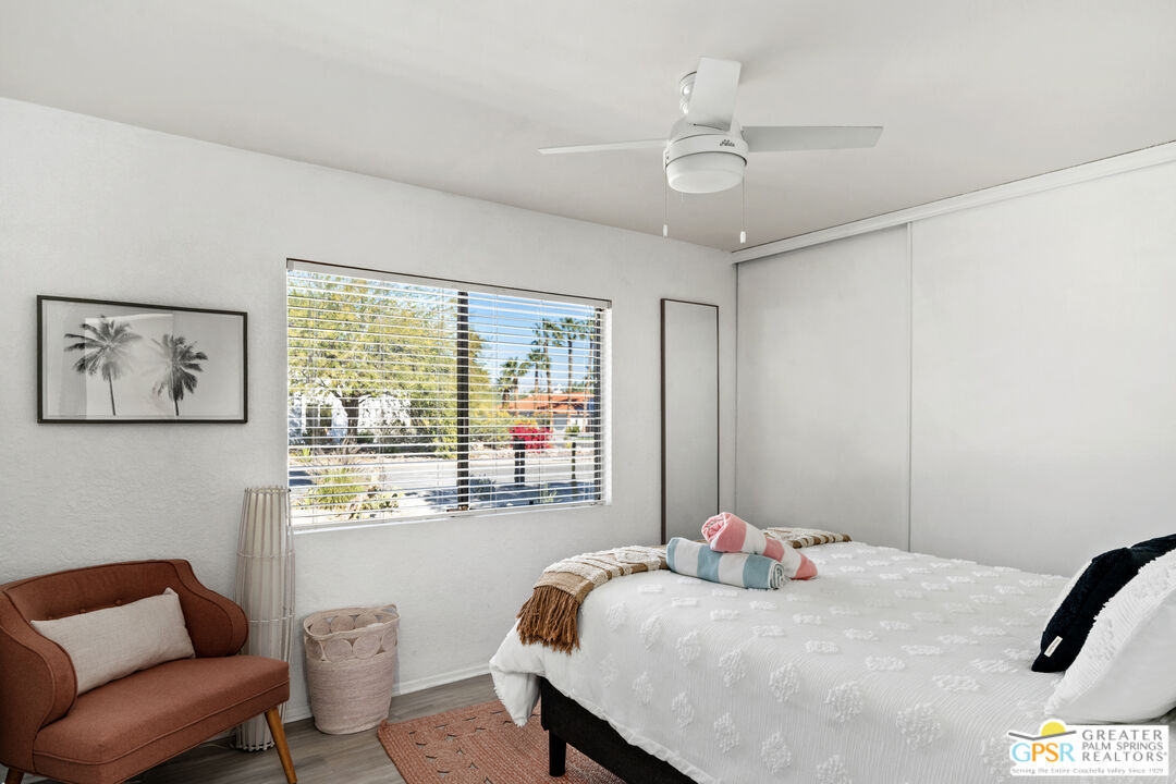 2493 East Powell Road Palm Springs, CA 92262 - Photo 11 of 43 a bedroom with a bed and a window