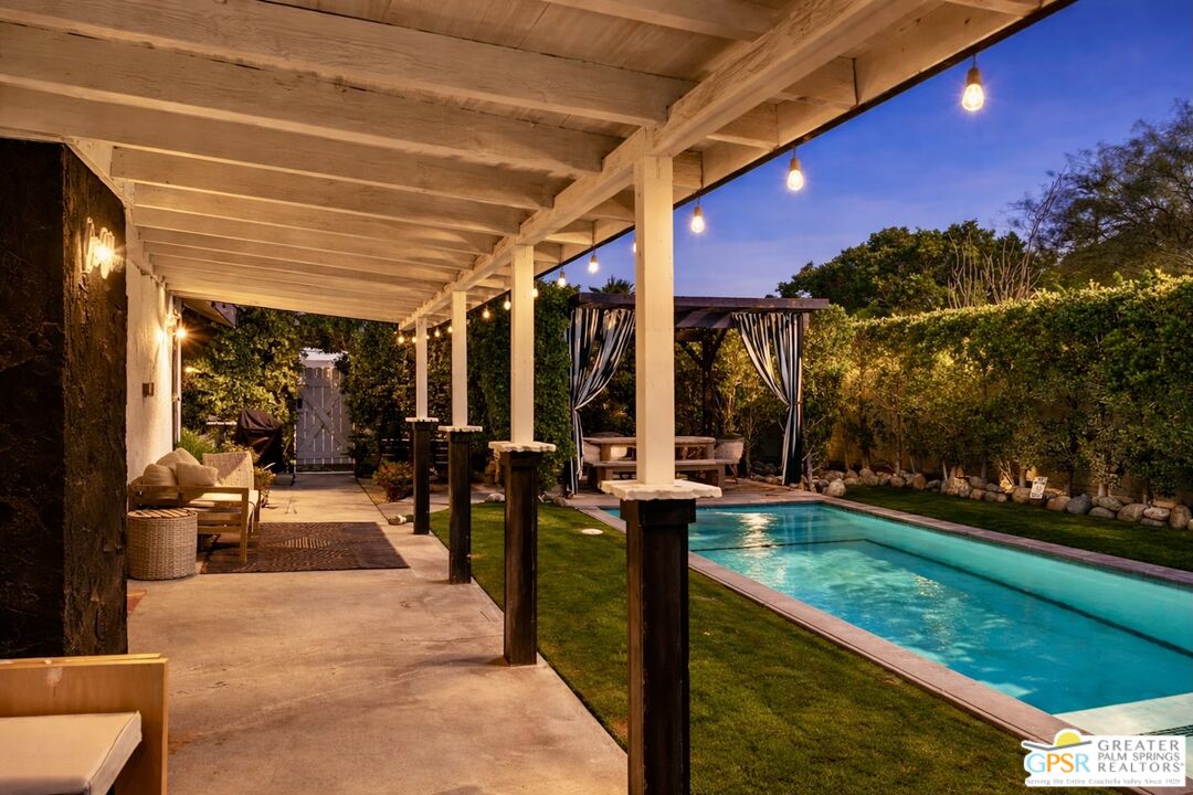 2493 East Powell Road Palm Springs, CA 92262 - Photo 27 of 43 a view of swimming pool with outdoor seating